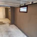 Traitement d'un garage humide grâce au cuvelage par l'entreprise Vivrosec